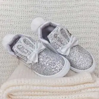 Glitter inks on baby shoe